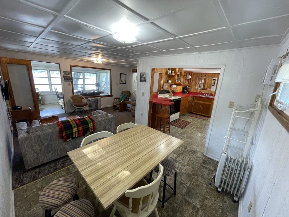 Dining for 6 inside adjacent to kitchen.