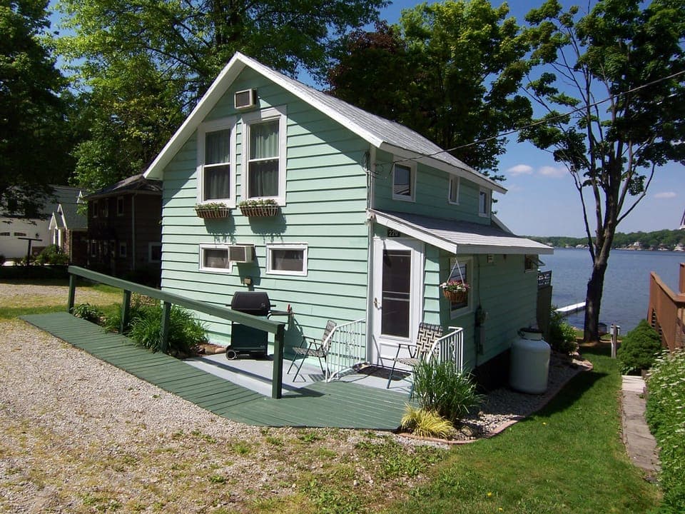 Rear entrance and 2 parking spaces. Additional parking available for trailers.
