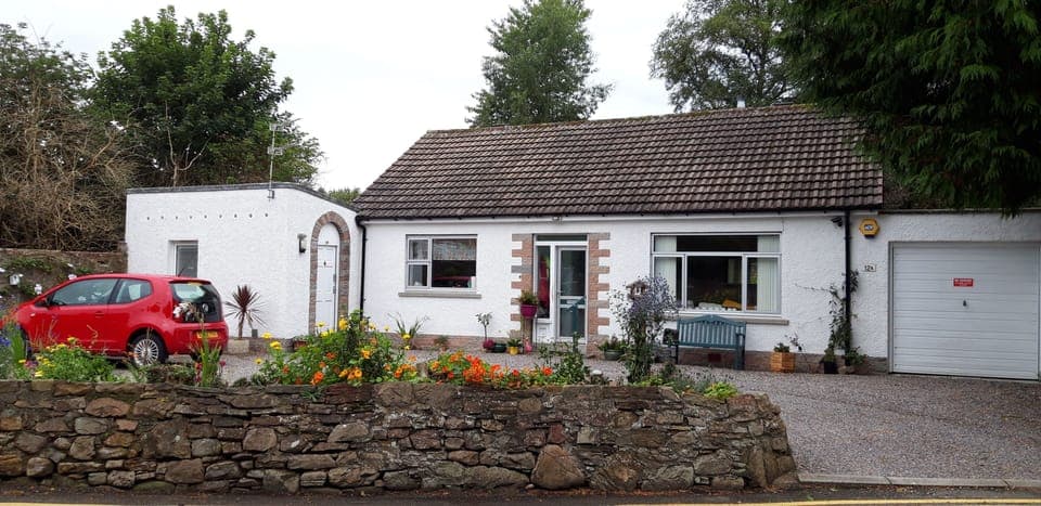 Your own entrance to the left of my house.  Plenty of parking. 