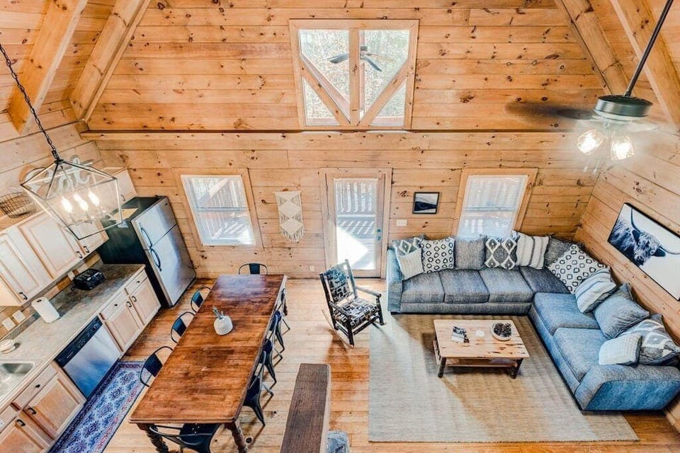 Awesome living room as you come downstairs from the loft. Relax with your friends and family.