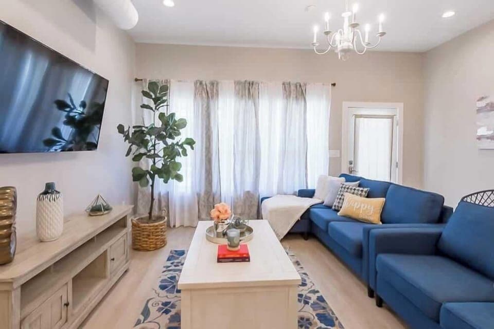 Welcome to Indianapolis! Our designer living room is the perfect place to unwind after a fun day of exploring the city.