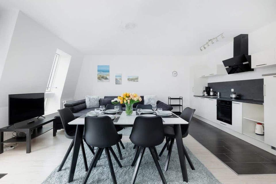 Living room of apartment Armii Krajowej 5/44 with table