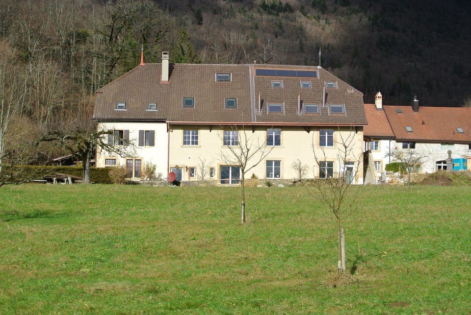 House. (see right part of the building)