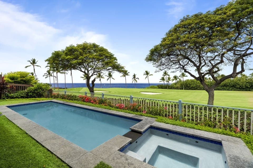 Swim laps or soak in the spa while enjoying palm-dotted ocean views from your private saltwater pool.