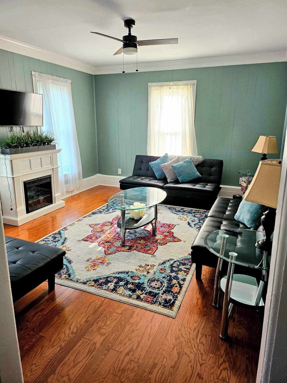 Living room, which is set off the dining room, includes 3 sleeper futons
