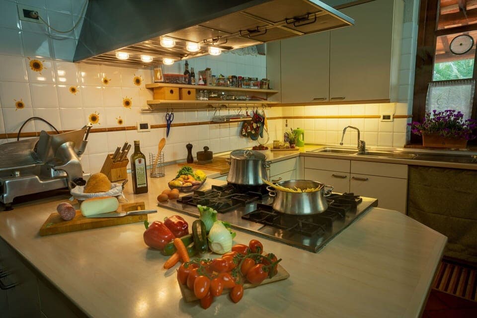 Food, Table, Tableware, Countertop, Kitchen, Interior Design, Cuisine, Cabinetry, Tap