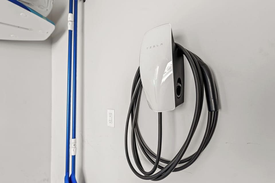 2 EV chargers, 1- NACS plug and a J1772 plug, 2- 1450 NEMA plug