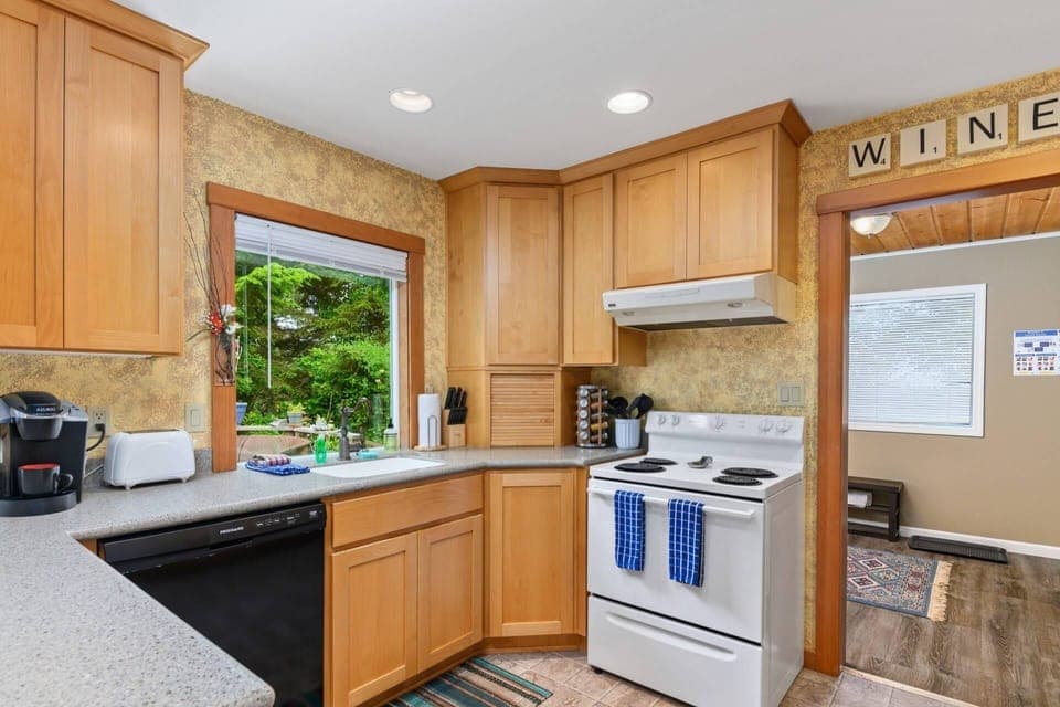 Your cozy kitchen is fully stocked for your culinary needs.