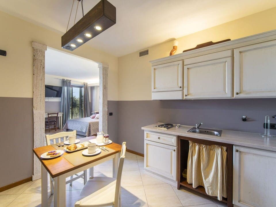 Cabinetry, Property, Furniture, Countertop, Wood, Interior Design, Table, Building, Kitchen, Flooring