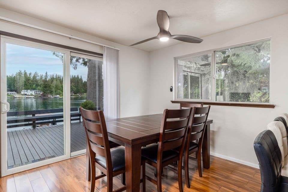 View of the lake from the dining room leading to the deck.