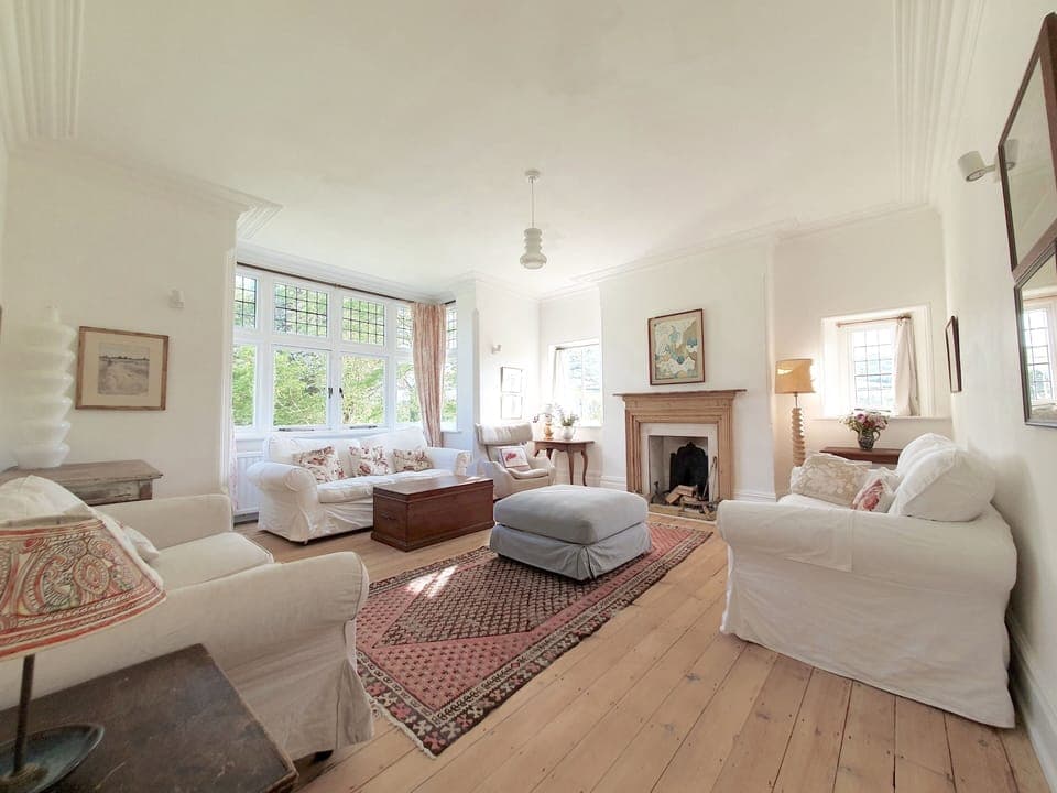 The sitting room at Rushay, with open fire and light on two sides