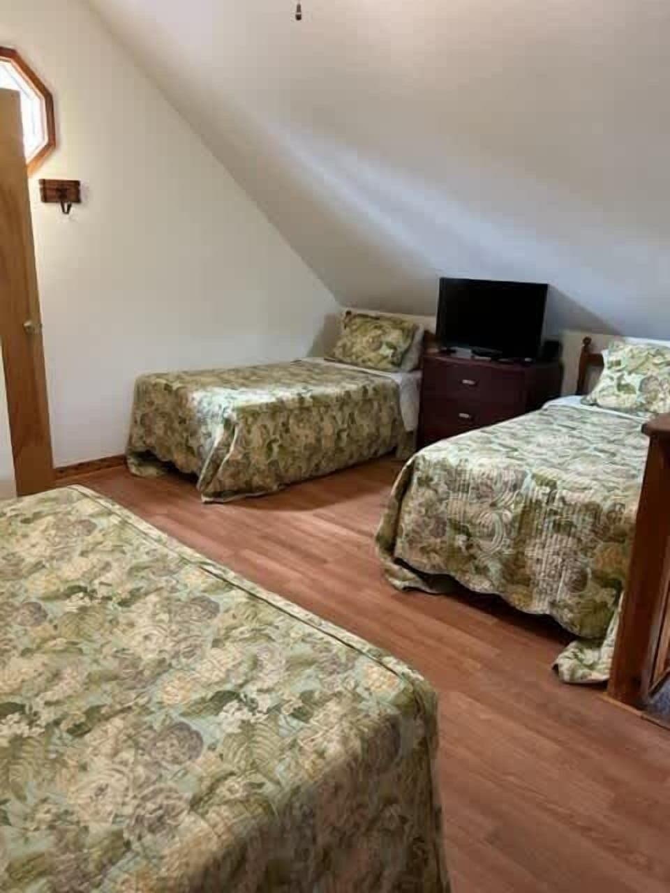 Queen and Two Twin Beds in Loft Area