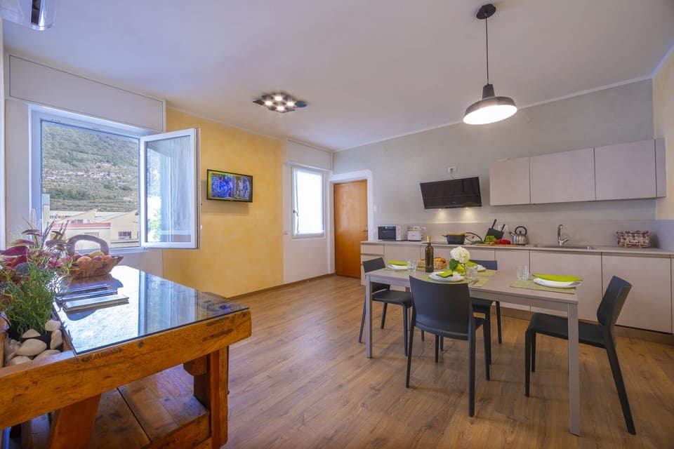 The cozy living room with the dining table