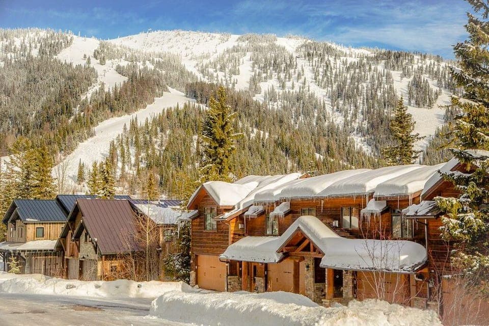 Exterior of the property during winter with amazing view of Whitefish Mountain Resort