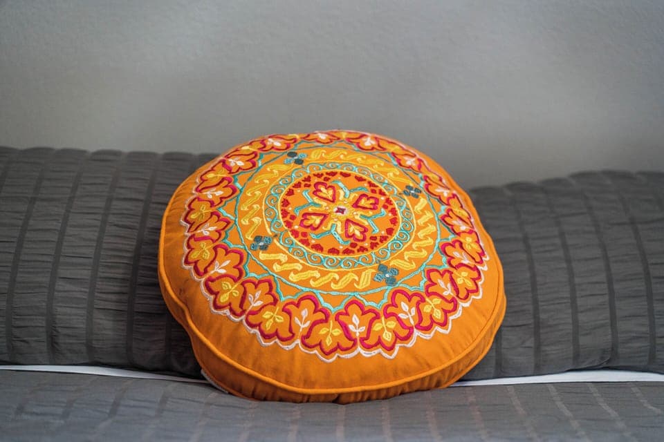 Stylish linens in the upstairs queen bedroom. 