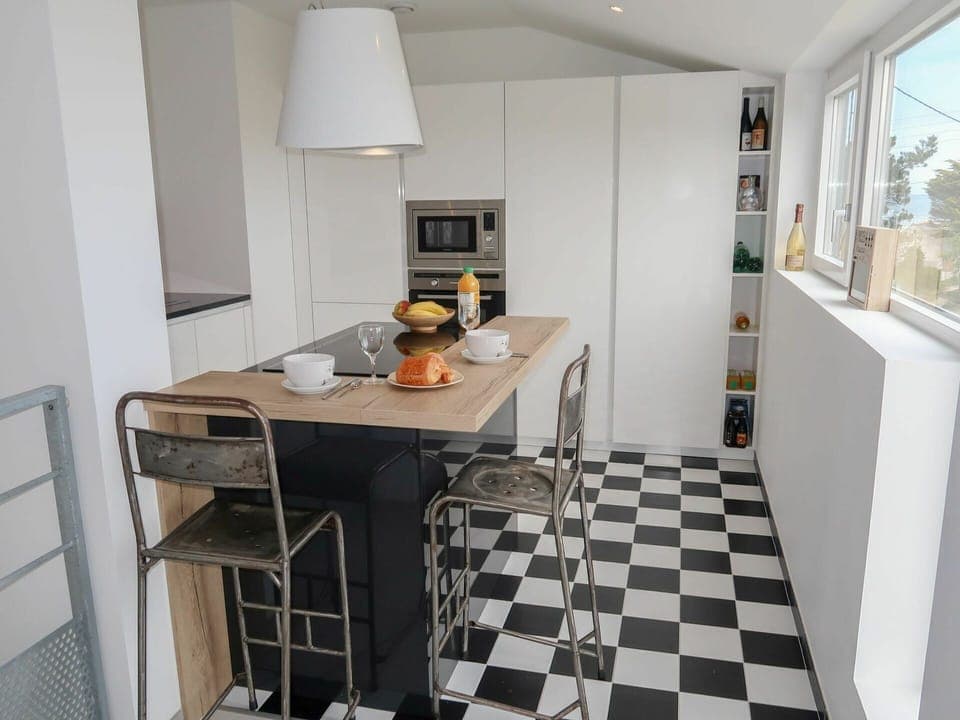 Cabinetry, Furniture, Countertop, Table, Kitchen Stove, Kitchen, Wood, Interior Design, Flooring, Kitchen Appliance