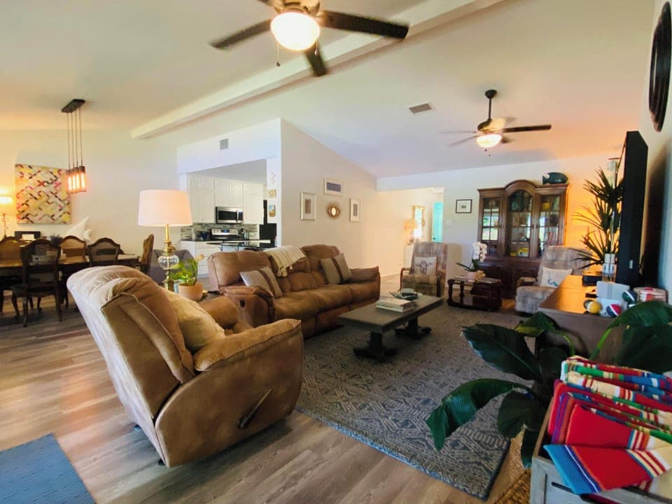 View of the living/dining/kitchen from the door of main bedroom.