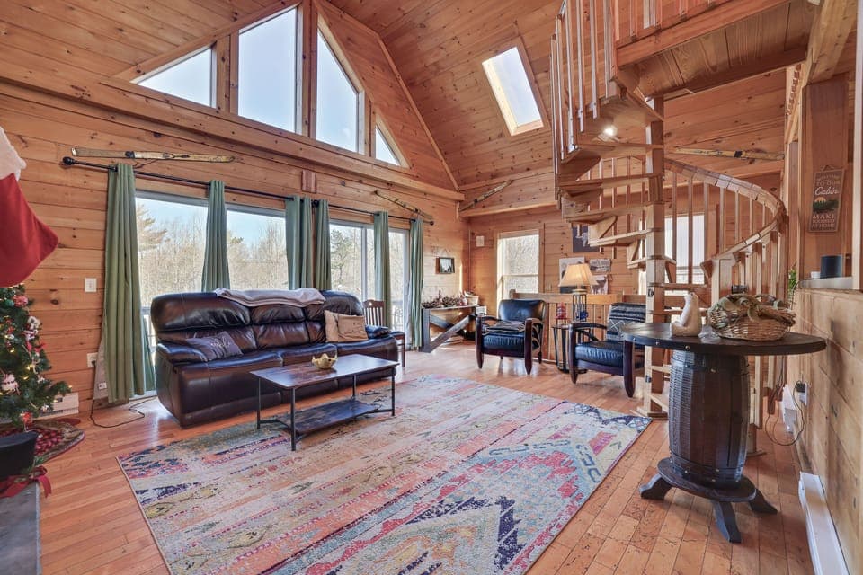 Cozy, sun-drenched Great Room w/ spectacular gas fireplace