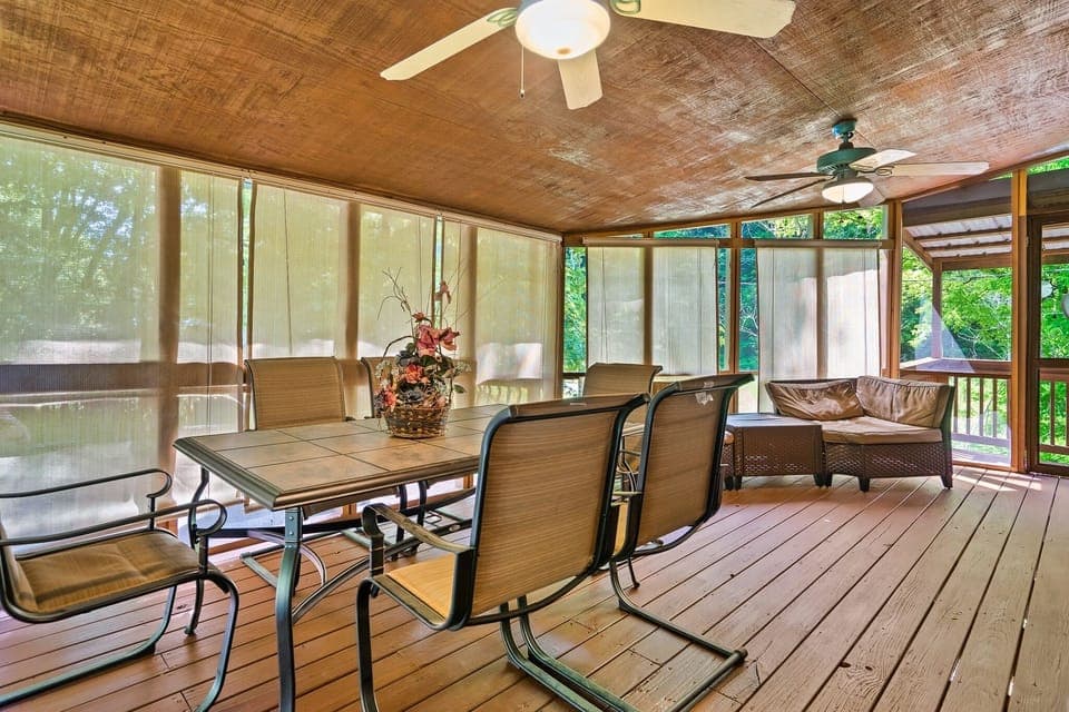 Enclosed and private front porch. open blinds for 180 views of forest and creek