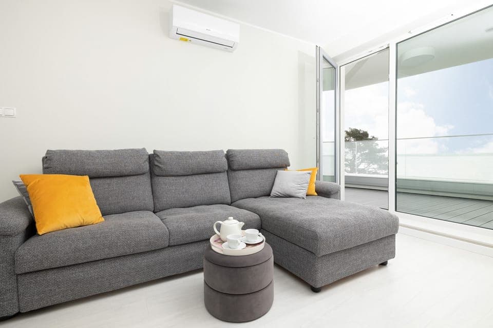 Living room with a comfortable sofa and TV. 