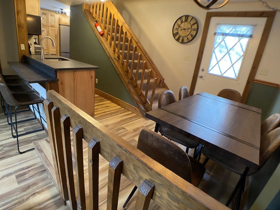 View of the kitchen and dining areas. 