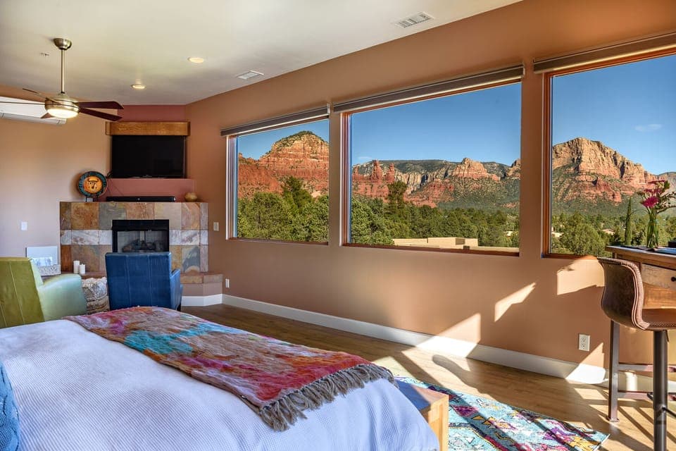 Watch the sunrise from bed in the master bedroom