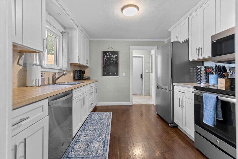 Fully equipped kitchen. Just past this is the laundry area, bathroom & bedroom