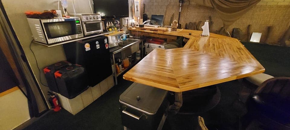 Appliances, Refrigerator, Full sink with disposal, 2 Ice chests, Shelving etc.