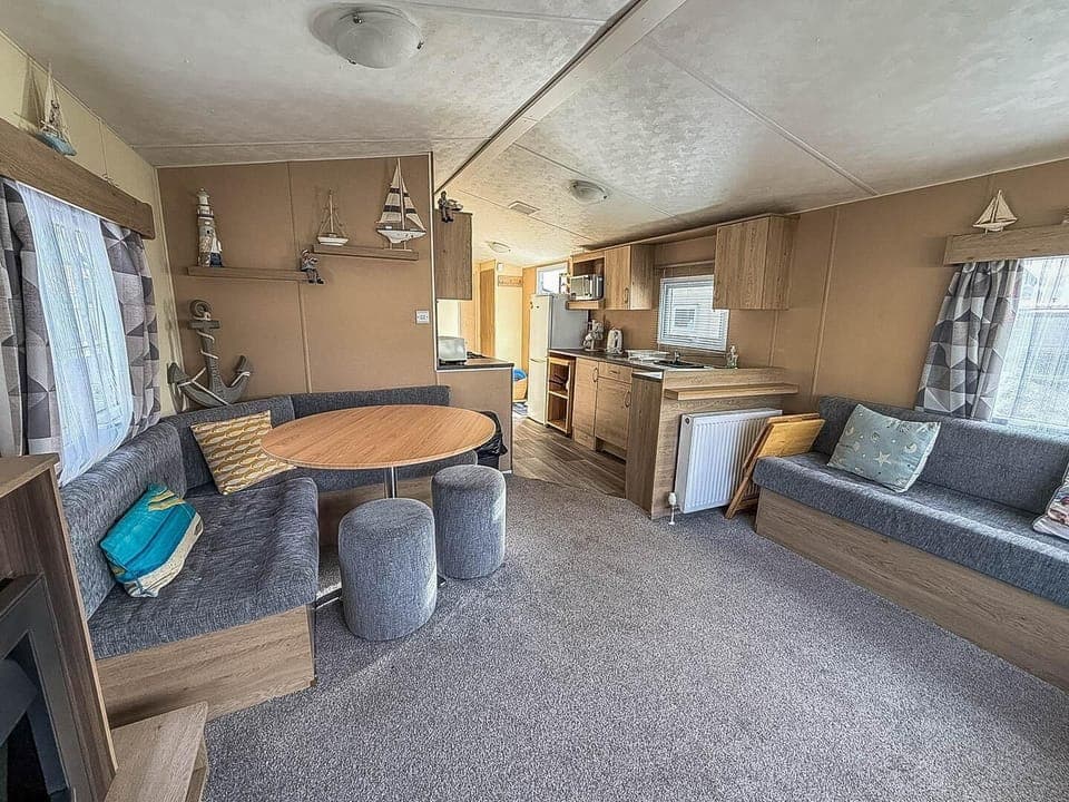 Cozy living and dining area with ample natural light