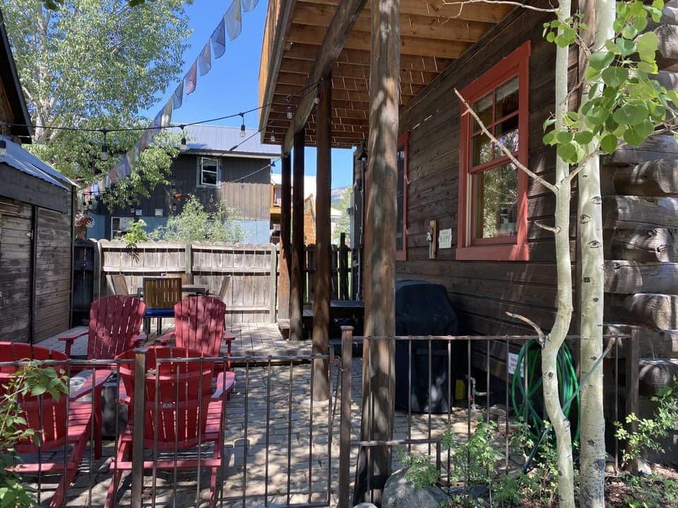 Great side patio for relaxing, dining and grilling