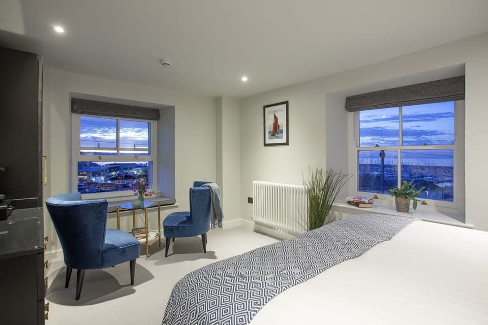 Seating area for two with sea view and king size bed - Pilgrim Suite