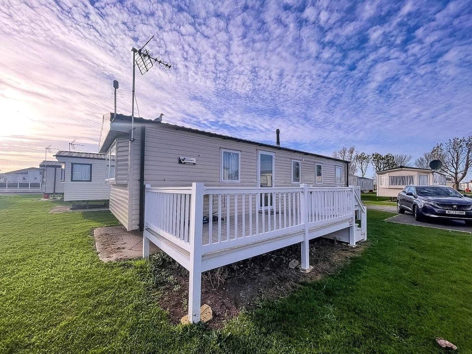 Spend sunny afternoons on the caravan decking, soaking up the coastal atmosphere at Seawick Holiday Park.