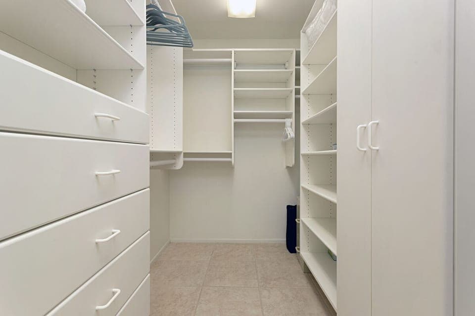 The large master bedroom closet is great for storing luggage