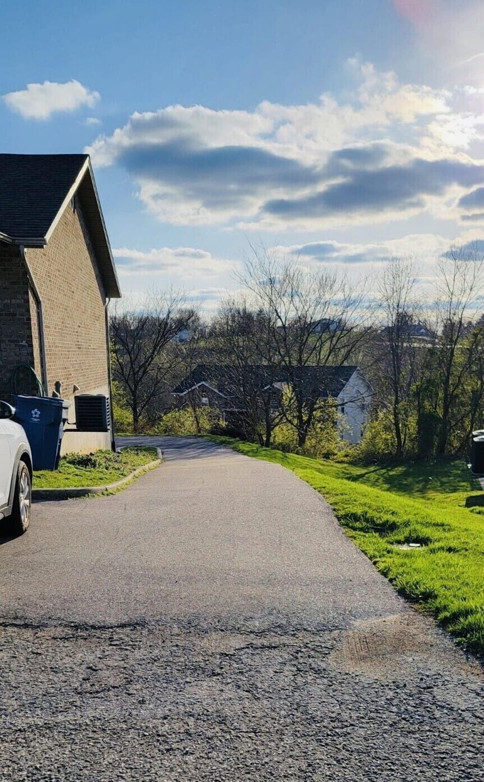Driveway leading to the back for additional parking 
