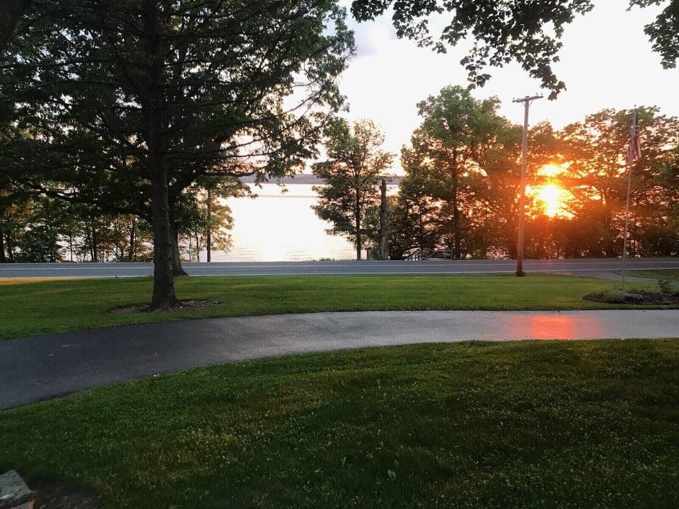 A short walk from the front yard, cross road, staircase to private lake area. 