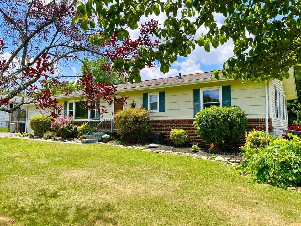 Redbud Retreat-named after our little prized weeping redbud in the front garden