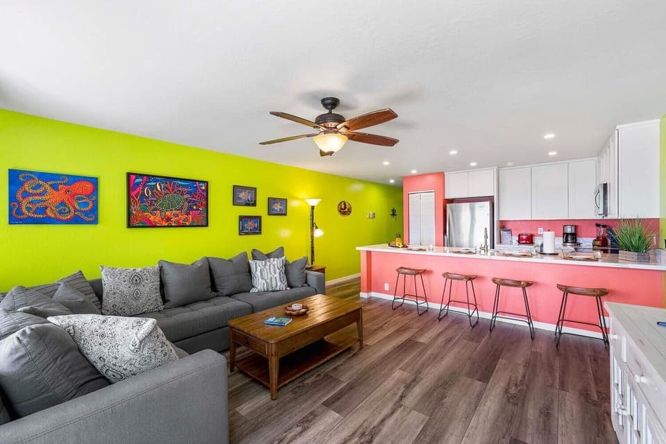 Living area/kitchen, beautiful flooring thru-out the unit