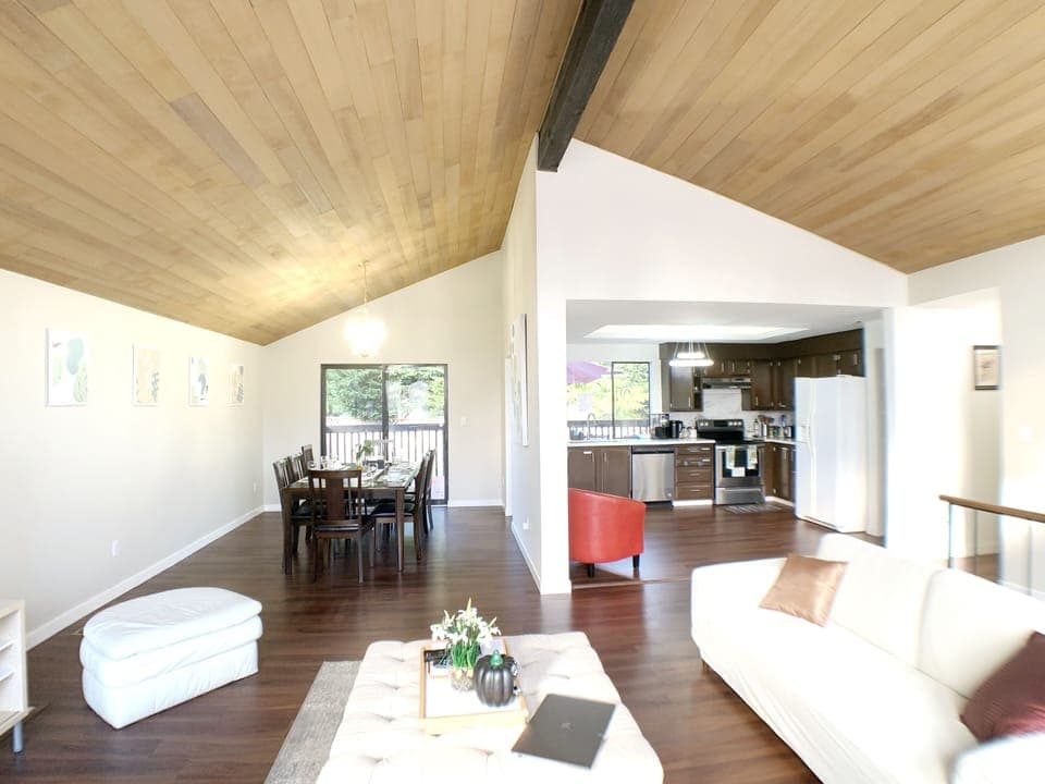 Open concept with wood vaulted ceiling