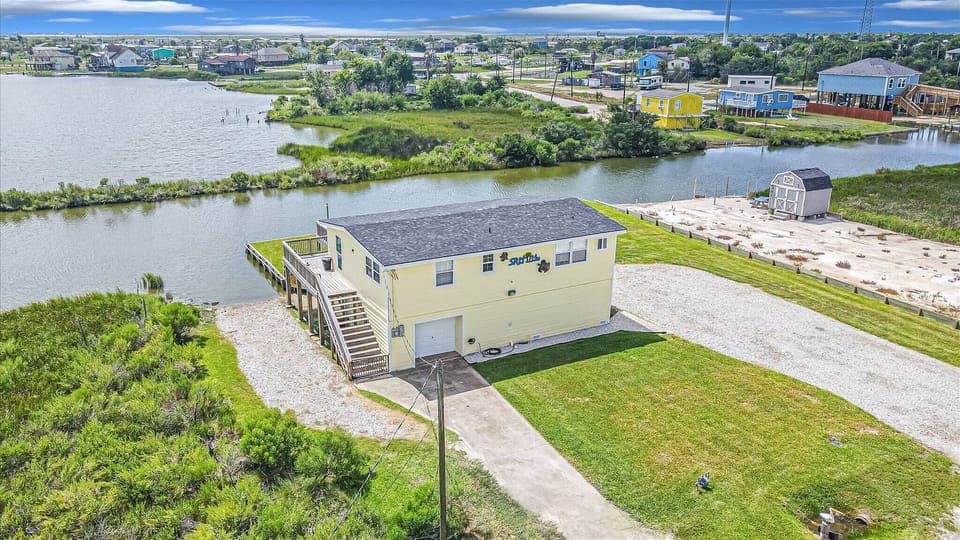 Aerial view, with two large driveways