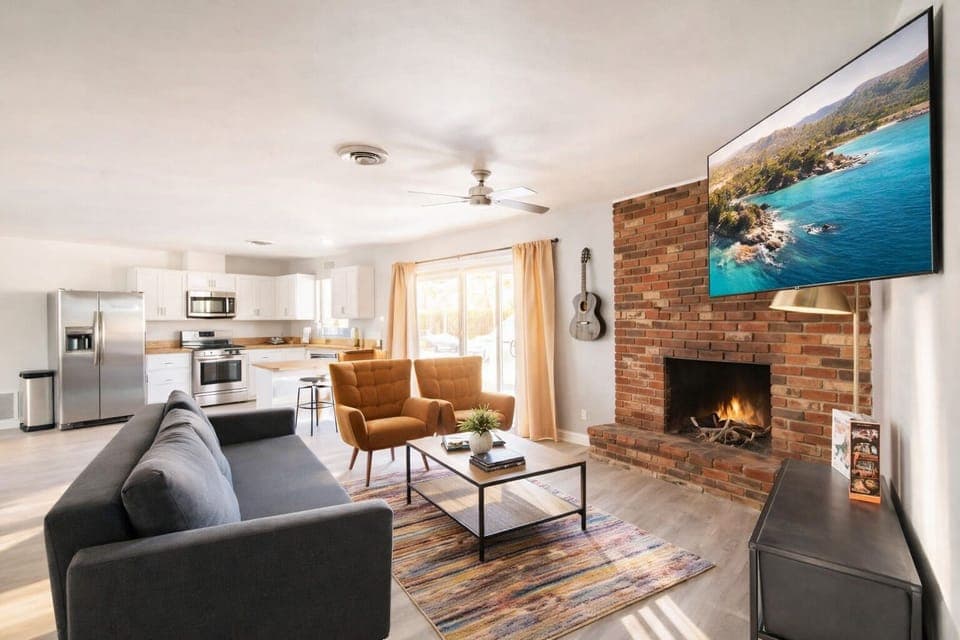 Inviting living room with fireplace, record player, and relaxed seating