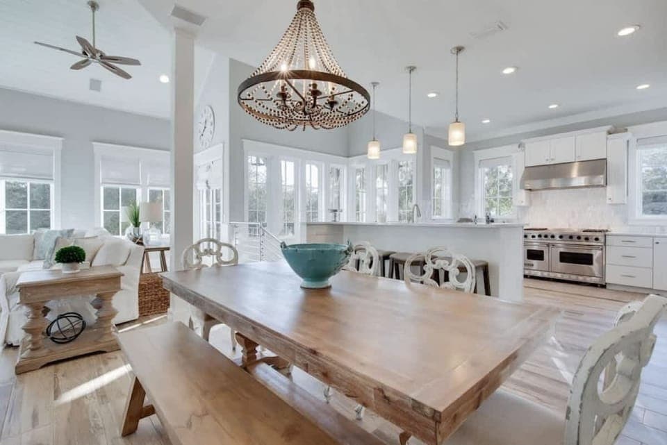 Open concept dining area and equipped kitchen
