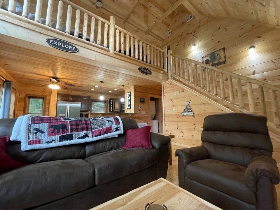 Spacious and comfortable living area is the gathering place for this beautiful cabin