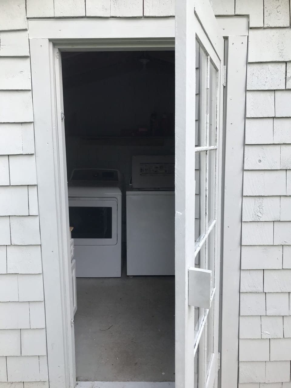 Washer and dryer on the south side of the house. 