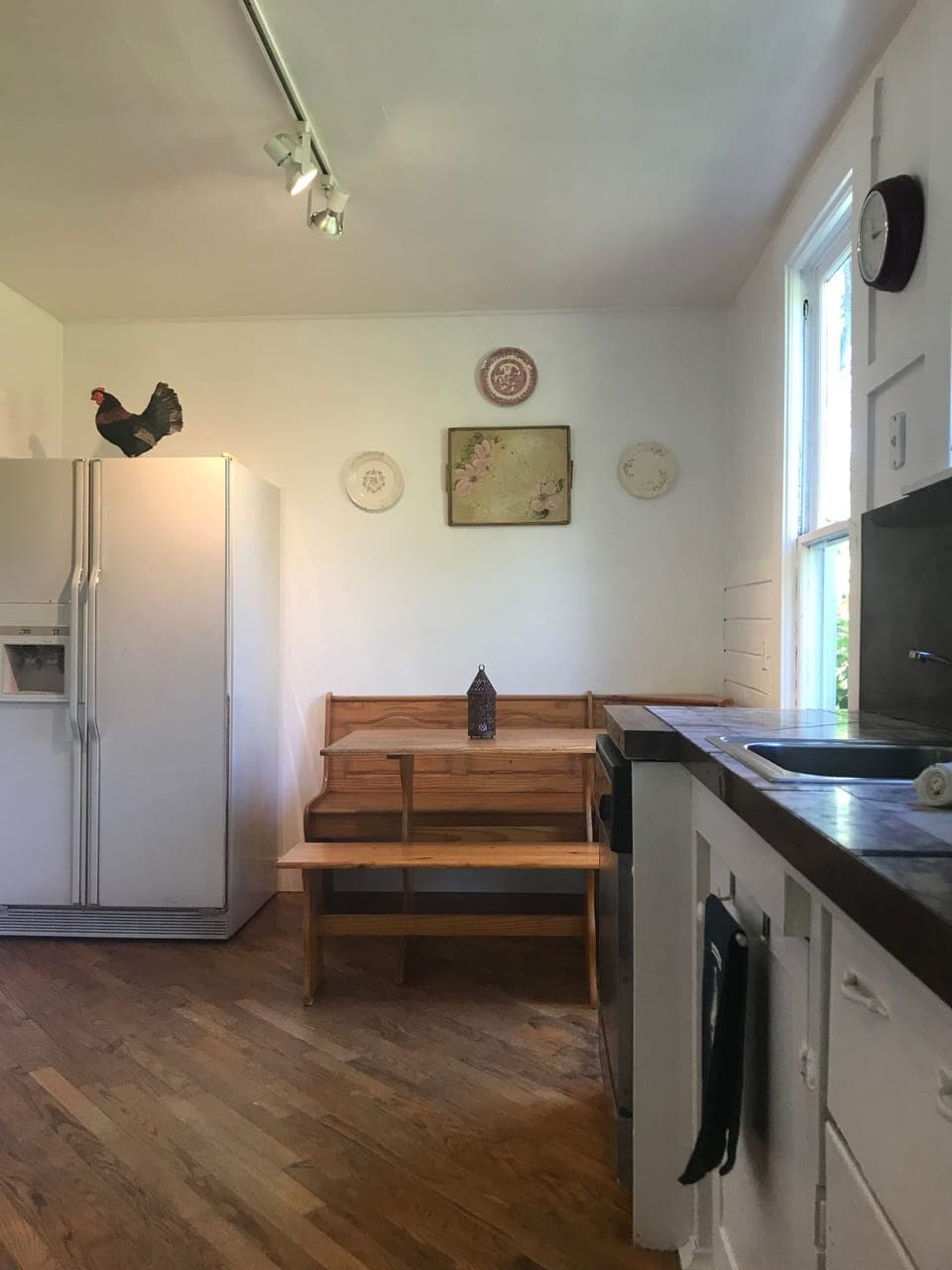 The  farmhouse kitchen.  Gas range, electric oven, dishwasher, etc.
