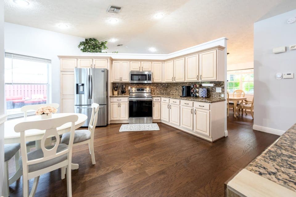 Gourmet kitchen with Stainless Steel appliances.