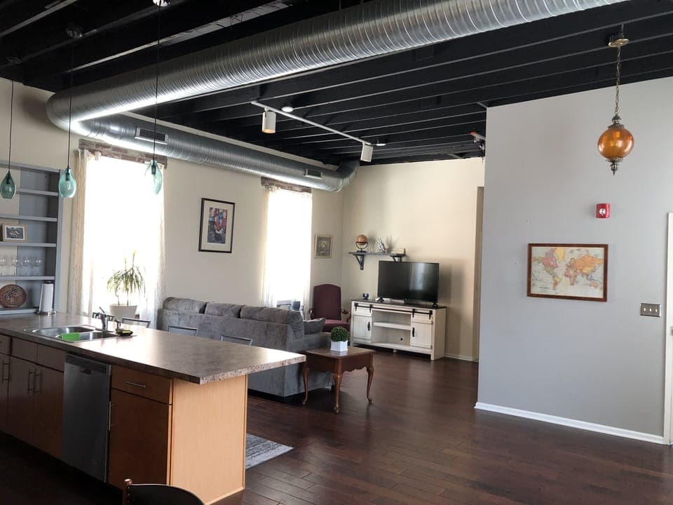 2 bedroom loft downtown condo with high ceilings, tasteful art, modern features.