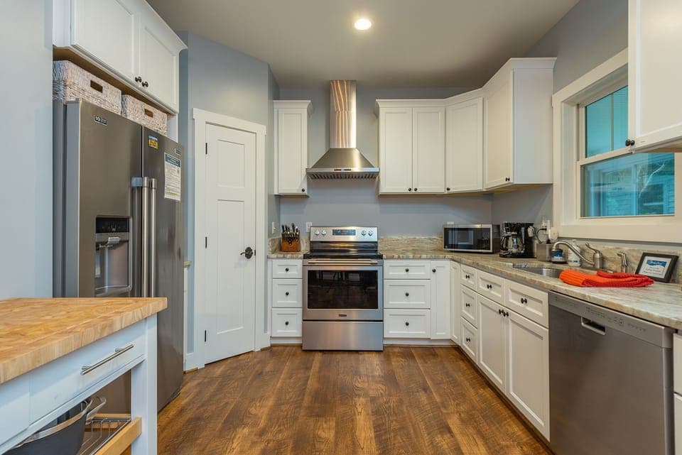 Whip up your favorites in the full kitchen featuring a stainless fridge, oven, microwave, and dishwasher.