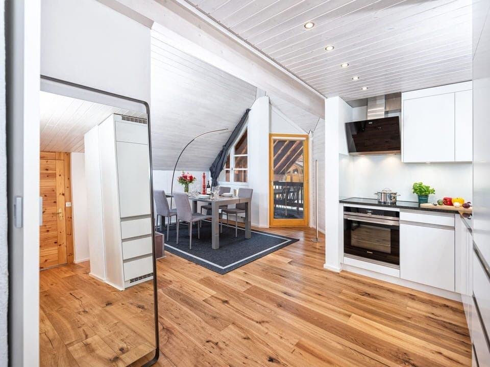 Property, Cabinetry, Countertop, Interior Design, Wood, Lighting, Orange, Kitchen Stove, Building, Flooring