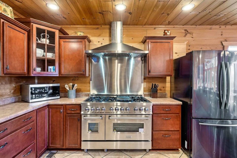 48" 8-burner range with double ovens.