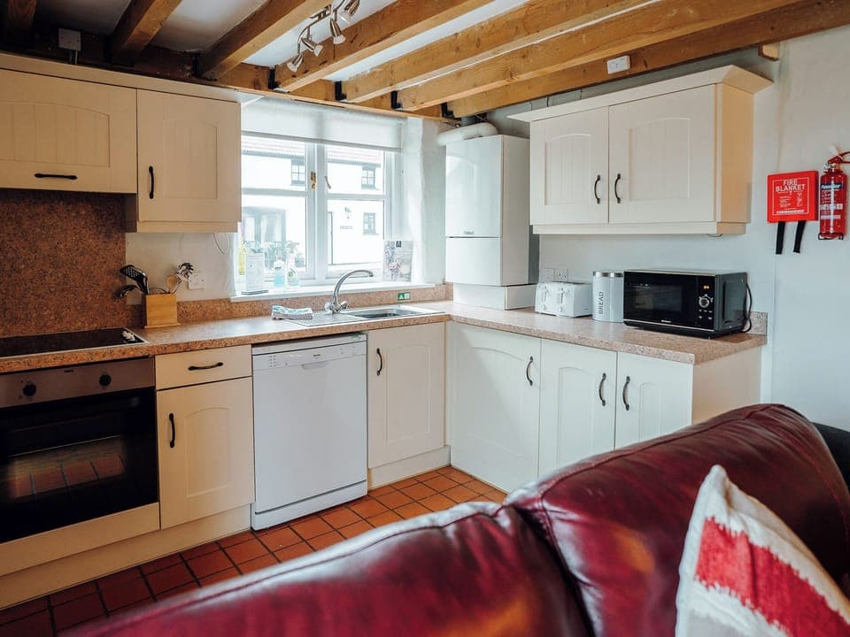 Kitchen area | St David&rsquo;s Lodge - Celtic Haven Resort, Lydstep, near Tenby
